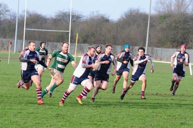 Graham Hogg on the charge for Scarborough RUFC in their defeat at Beverley. Pictures by Andy Standing.