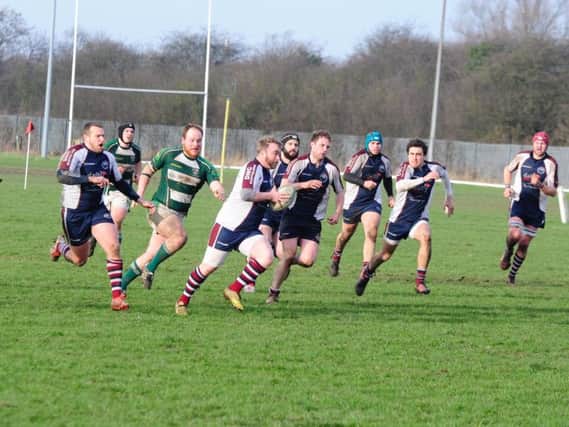 Graham Hogg on the charge for Scarborough RUFC in their defeat at Beverley. Pictures by Andy Standing.