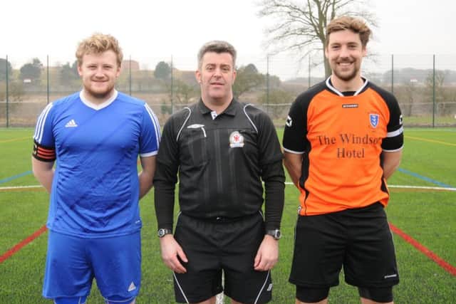 Flamborough 2nds Captain James Hodgson, Referee Mark Edwards and Bridlington Rovers Captain Tom Broadbent