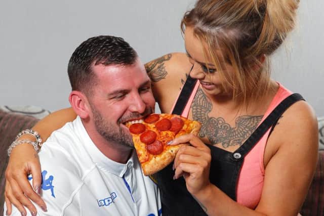 Sharing a pizza.  Glen Minikin - Courtesy of The Sun
