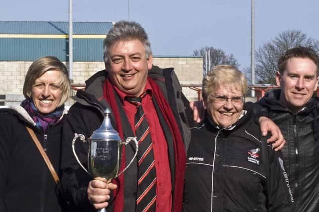 Dave Holland, second left, pictured holding the NCEL Premier trophy with Wendy Danby, Sandra Troughton and Geoff Osguthorpe
