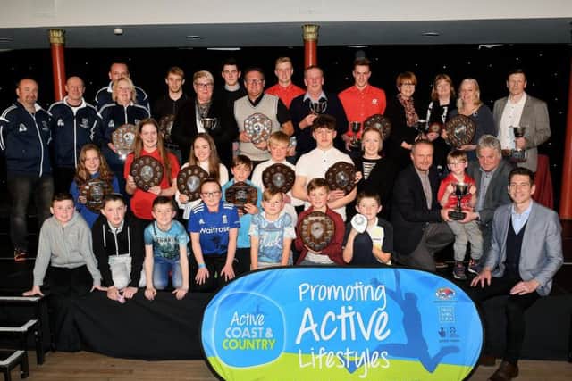 All the winners up on the stage with guest of honour Chris Cook