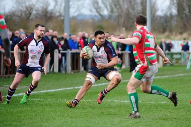 Isaac Faamau on the charge against Keighley, flanked by veteran Graeme Jeffrey. Pictures by Andy Standing.