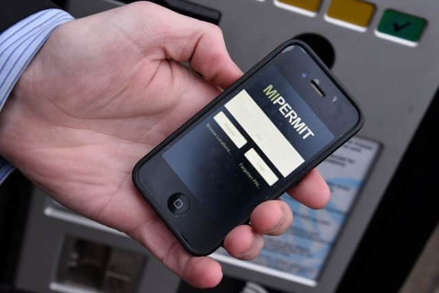 A mobile showing the MiPermit app