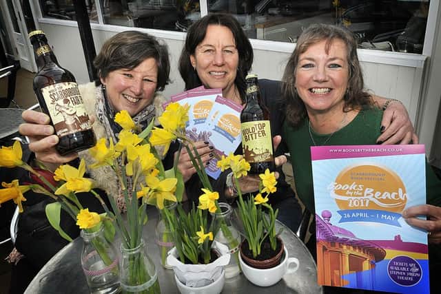 The Watermark Cafe celebrating Books on the Beach and Wold Top Brewery . Gill Mellor from Wold Top Brewery,Watermark owner Gill Partridge and Books by the Beach organiser Heather French