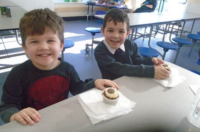 Tommy and Tyler Finch enjoying the tea party.