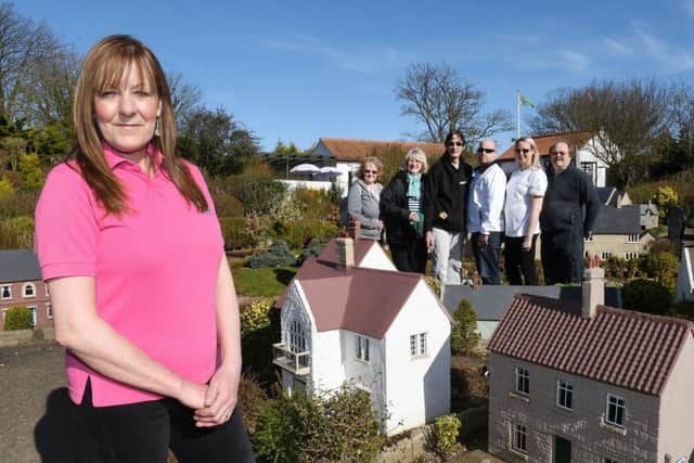 Bondville Model Village owner Jan Whitehand with the team of volunteers working to get the attraction ready for its opening on April 1