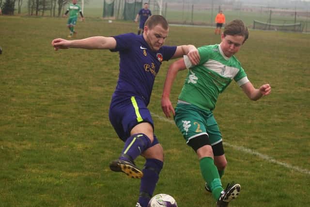 Niall Prentice in action during Goalsports' 3-0 home win against Fishburn Park Reserves, green kit