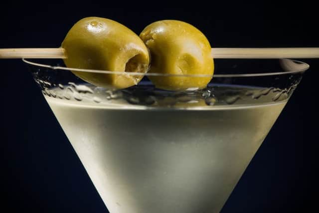 Getting the day off to a good start with two olives in a breakfast Martini.