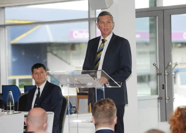 DRIVING YORKSHIRE FORWARD: Yorkshire CCC chief executive Mark Arthur addresses the club's AGM at Headingley on Saturday, with director of ccricket, Martyn Moxon, watching on. Picture: Steve Riding.