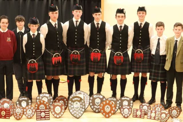 Some of the trophy winners at the annual Solo Piping and Drumming Contest