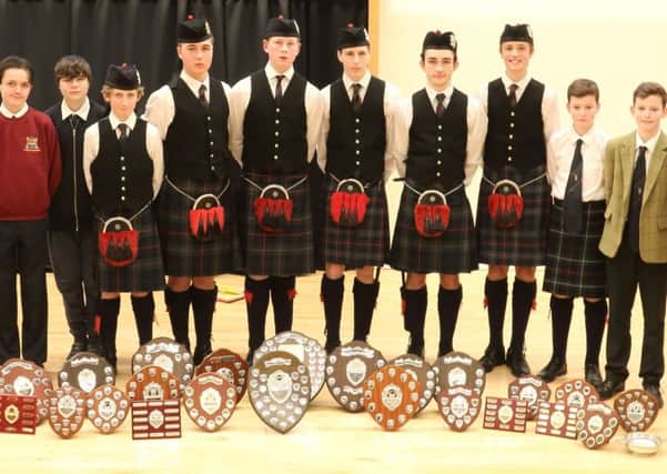 Some of the trophy winners at the annual Solo Piping and Drumming Contest