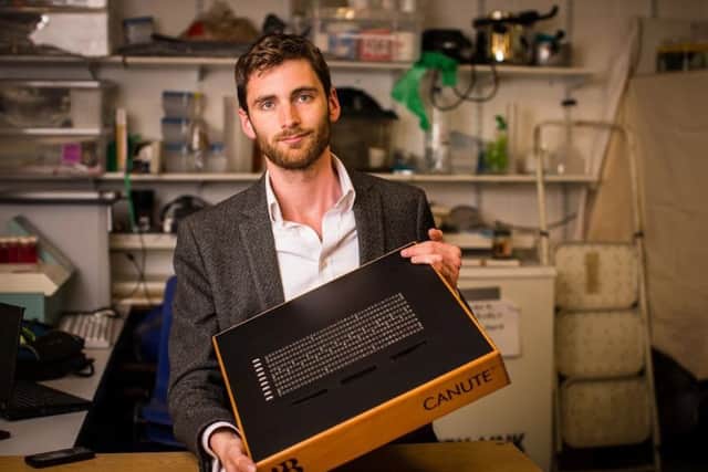 Ed Rogers, 29, Director at Bristol Braille Tech with the Canute E-Reader, SWNS