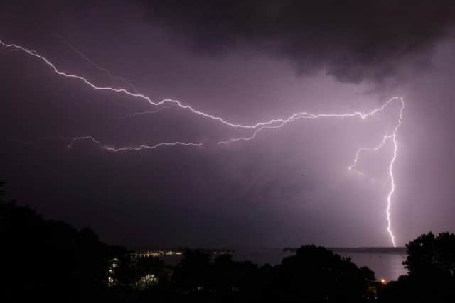 Lightning strikes over Poole harbour in Dorset as thunderstorms swept across parts of south west England after much of the country basked in sunshine and clear skies for the last few days. The storm is now heading north.