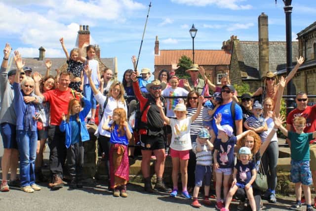 Terrington Hall Schools headmaster Stephen Mulryne is greeted by pupils, parents and friends on the final leg of his 188-mile journey.