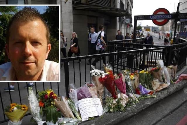 Flowers left at the scene in London and, inset, Mark Townsend