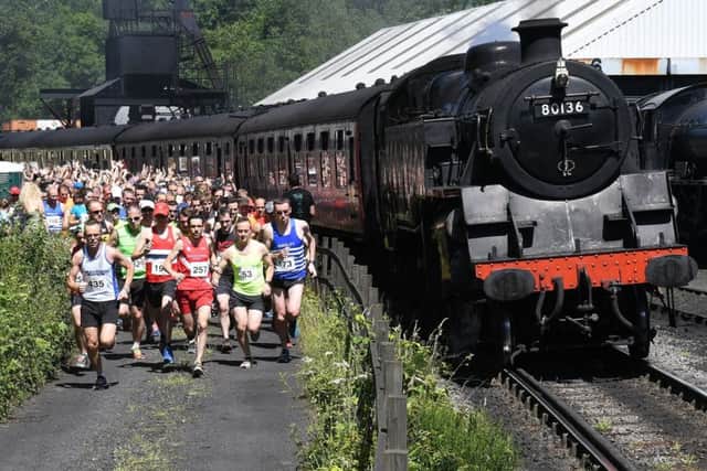 Runners set off from Grosmont Railway Station during this weekend's Race the Train event. Picture: Paul Atkinson