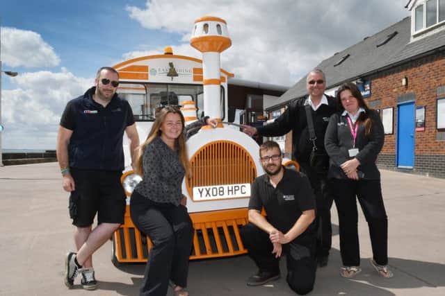 The foreshores team with the land train which transports thousands of visitors every year