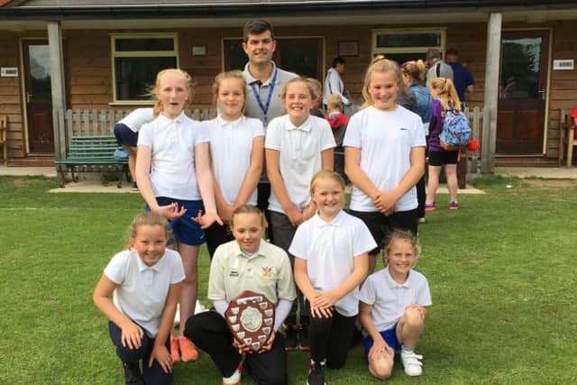 The victorious Cayton Primary School team with coach Mark Vasey