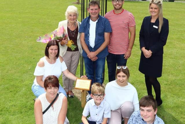 The Dunwell-McPhee family with Holly Collings from Taylor Wimpey.