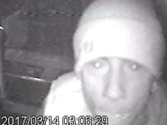 The CCTV shot of the man being sought by police.