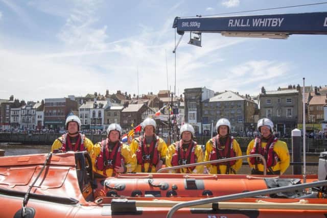 RNLI crew with their new in-shore lifeboat