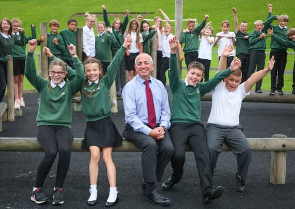 Airy Hill headteacher Jim Lidgley with the year 6 leavers, Jim is leaving the school this summer after 11 years. w172901a
Picture: Ceri Oakes. 19 July 2017.