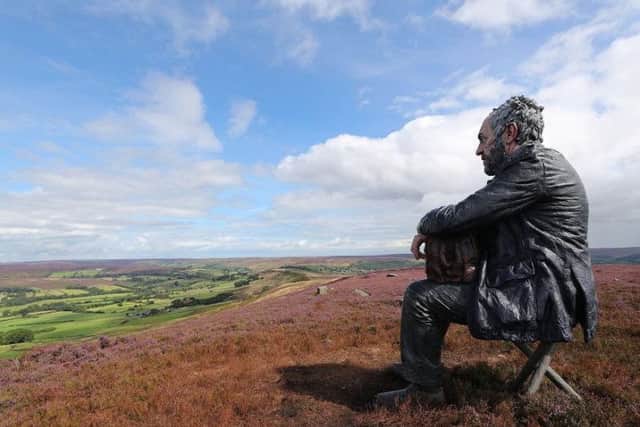 The Seated Man, a three-meter sculpture by Sean Henry, at Castleton Rigg, near Westerdale in the North York Moors National Park. Picture: Owen Humphreys/PA Wire