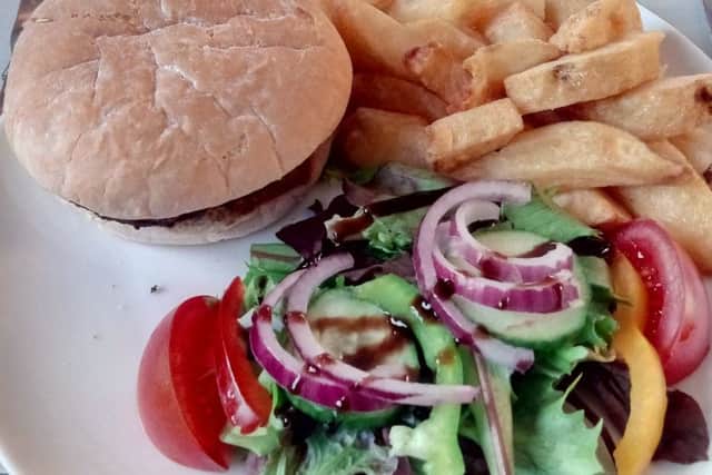 Minted lamb burger with salad.