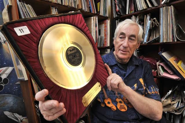 Charles White known as Dr Rock is selling his wonderful collection of vinyl records from his home in Scarborough. Pictured with his rare Bill Hayley gold disc.
Pictures by Richard Ponter.