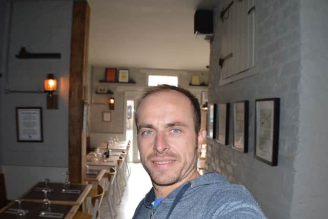 Funny Onion owner Robert Redshaw is pictured in the renovated Coach House Bistro.