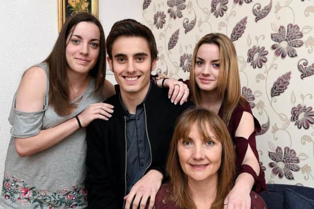 Triplets Olivia, Ronan and Mary with mum Jane Ingram PA1737-2c