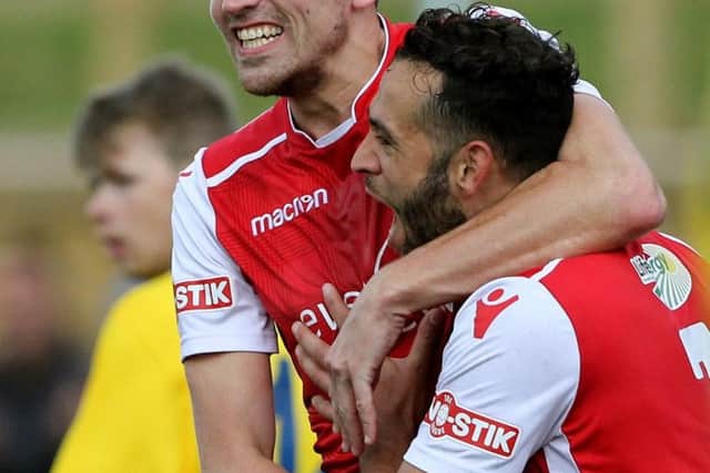Ross Daly celebrates Luke Dean's goal