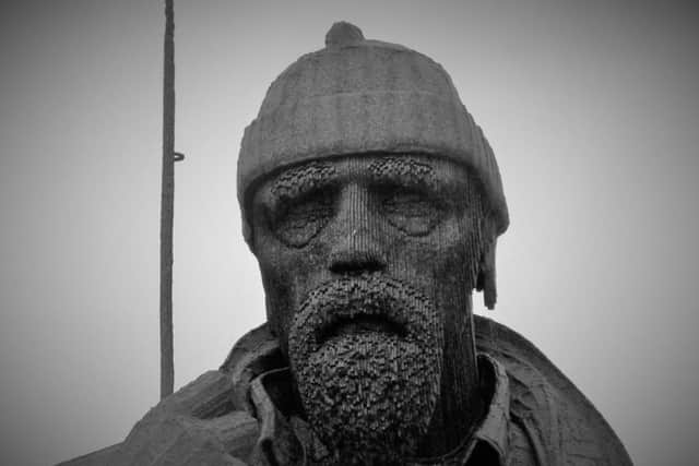 This atmospheric photograph of the Filey Fisherman was taken by Bob Taylor