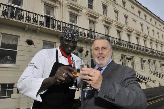 Chef Ousseynou Wade and Roberto Ramirez outside the Mount Hotel. (174731b)