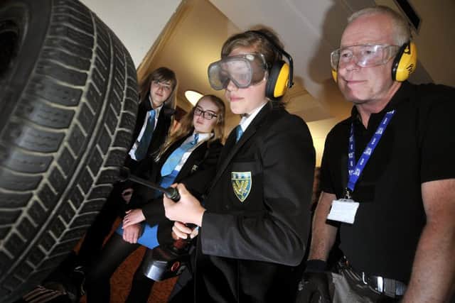 Scarborough Engineering Week 2017 Scalby School's Sammie Hellawell,Charlotte Stephens and Maisy McGeown work with Paul Shippin from Scarborough Tech.. pic Richard Ponter 174912e
