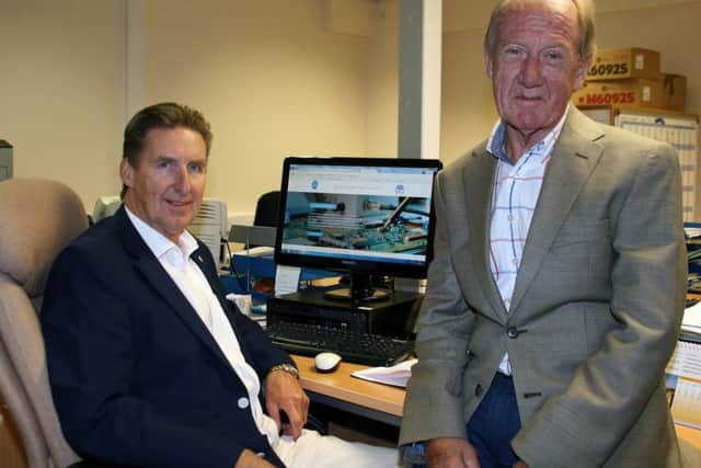 Care Micros managing director Mike Shingler, left, with Jim Sloan, the firms finance director.