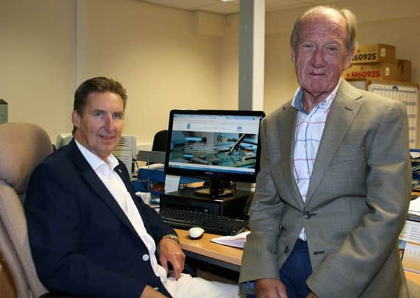 Care Micros managing director Mike Shingler, left, with Jim Sloan, the firms finance director.