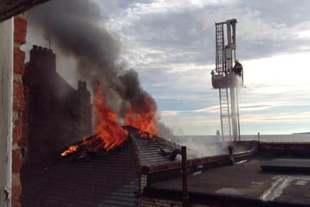 Flames through the roof of the fish and chip shop