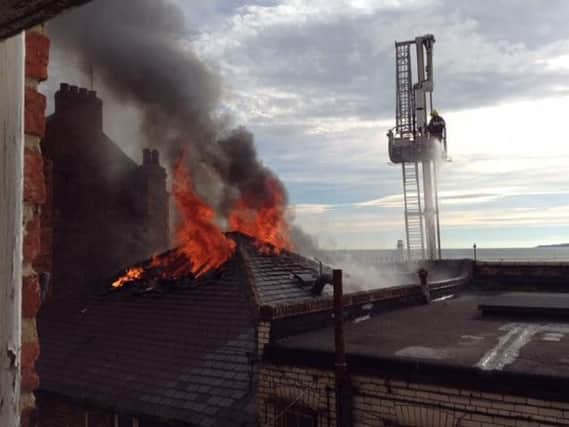 Flames through the roof of the fish and chip shop