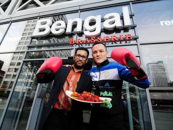 Leeds Warrior Josh Warrington and Bengal Brasserie managing director Malik Miah celebrating knockout new curry - the Rogan Josh Warrington