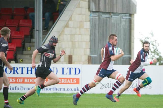 Ben Martin charges clear to score Scarborough RUFC's second try. Picture by Andy Standing.
