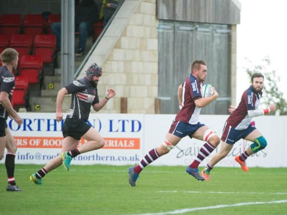 Ben Martin charges clear to score Scarborough RUFC's second try. Picture by Andy Standing.