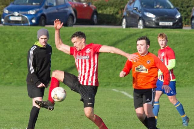 Radio Scarborough and Valley FC in action