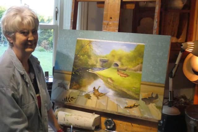 Janette Boskett at work in her studio.