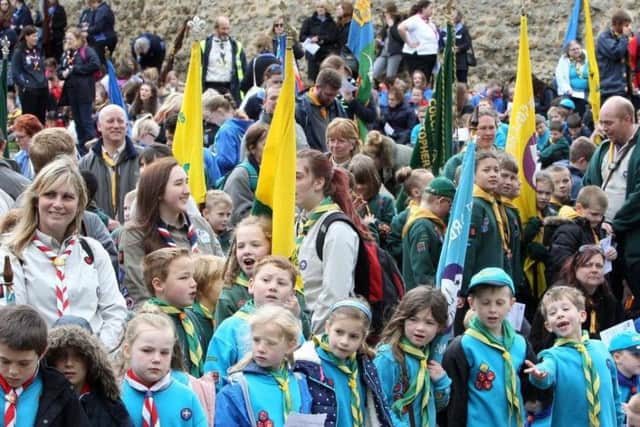 Scouts and Girl Guides join forces for a St Georges Day celebration.