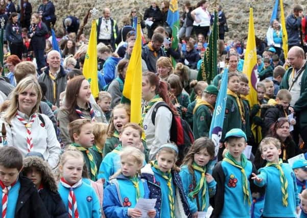 Scouts and Girl Guides join forces for a St Georges Day celebration.