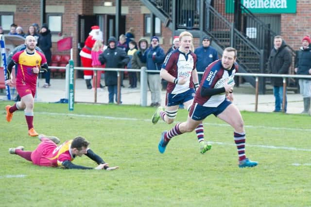 Tom Ratcliffe charges clear to touch down for Scarborough. Picture by Andy Standing,