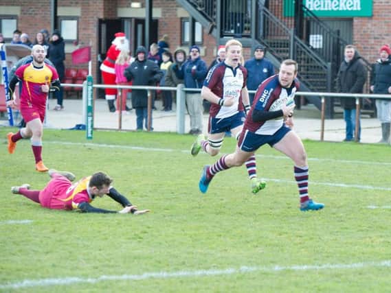 Tom Ratcliffe charges clear to touch down for Scarborough. Picture by Andy Standing,