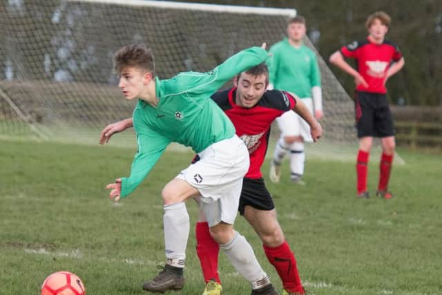 Sherburn's Harry Ward on the ball in his side's 9-1 win at Old Vic. Picture by Steve Lilly.